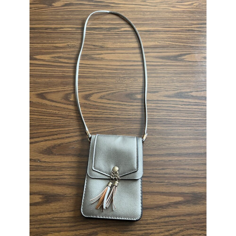 Crossbody bag with tassels and clear cell phone pouch